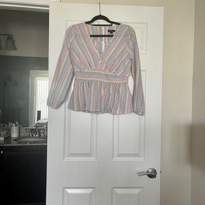 Multi color size 4 peplum top.